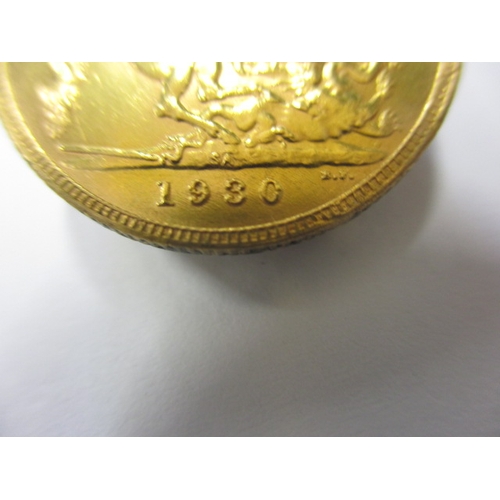 159 - A George V gold sovereign dated 1930, a circulated coin with fine definition of features