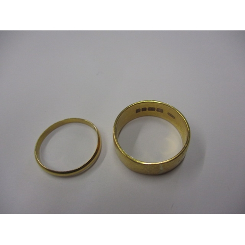 62 - Two vintage 22ct yellow gold wedding bands, approx. ring sizes ‘S & O’, approx. width of widest 6.7m... 