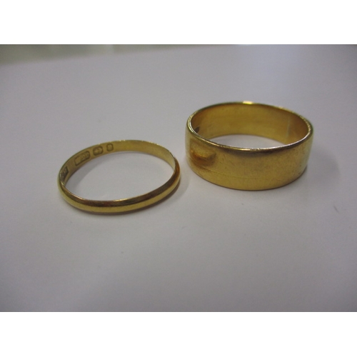 62 - Two vintage 22ct yellow gold wedding bands, approx. ring sizes ‘S & O’, approx. width of widest 6.7m... 