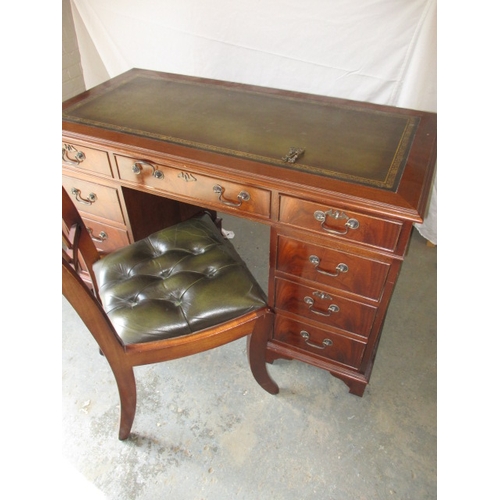 323 - A 20th century 8 drawer pedestal desk, with green inset writing surface, comes in 3 parts for ease o... 