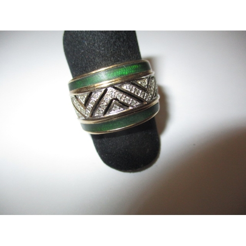 11 - A vintage 9ct gold, diamond and enamel dress ring, approx. ring size ‘M+’ approx. weight 5.9g in use... 