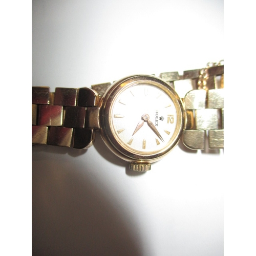 98 - A vintage 9ct gold ladies Rolex watch with gold strap, in current working order