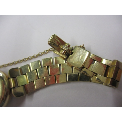 98 - A vintage 9ct gold ladies Rolex watch with gold strap, in current working order