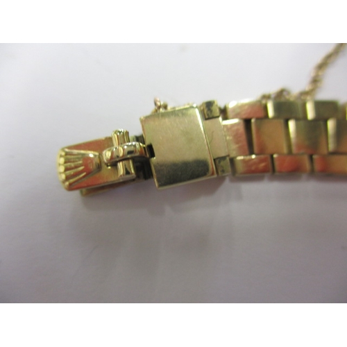 98 - A vintage 9ct gold ladies Rolex watch with gold strap, in current working order