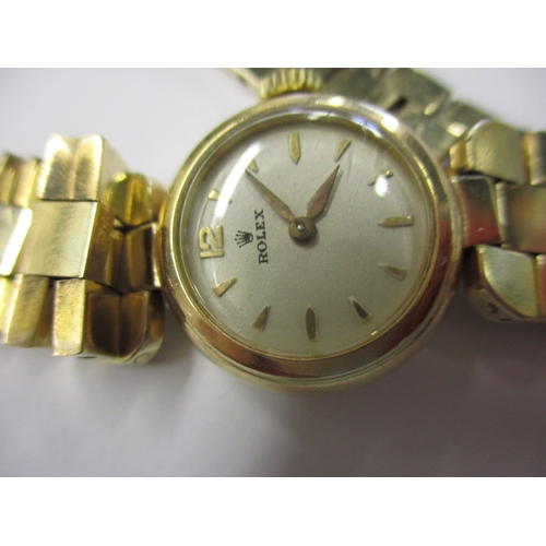 98 - A vintage 9ct gold ladies Rolex watch with gold strap, in current working order