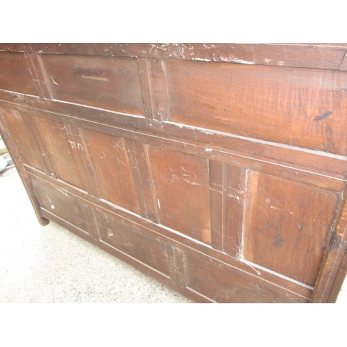 329 - An antique mixed wood box settle with carved back panel, with later upholstered cushion, approx. len... 