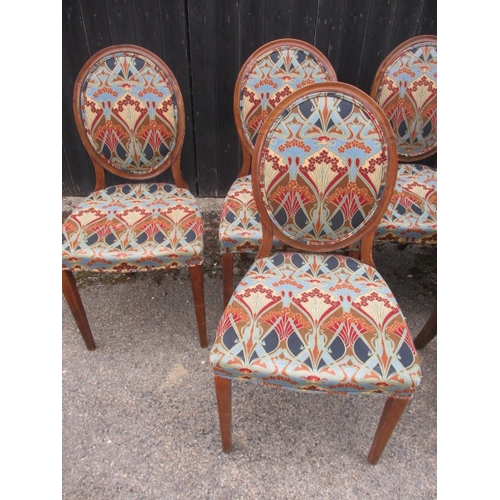 317 - 10 dining chairs comprising of 8 Victorian walnut spoon back dining chairs and 2 closely matched oak... 