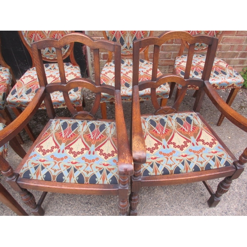 317 - 10 dining chairs comprising of 8 Victorian walnut spoon back dining chairs and 2 closely matched oak... 