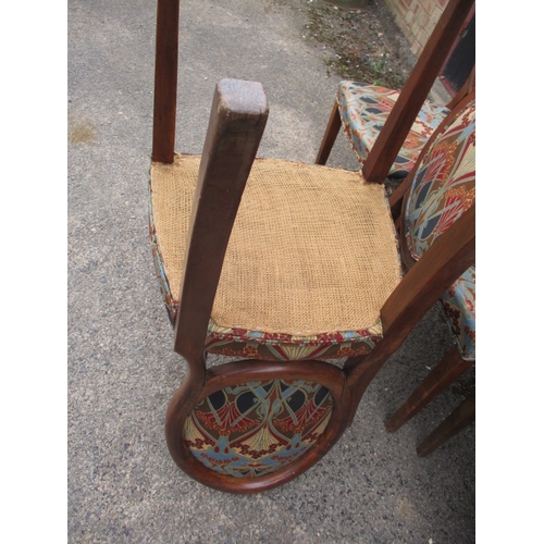 317 - 10 dining chairs comprising of 8 Victorian walnut spoon back dining chairs and 2 closely matched oak... 