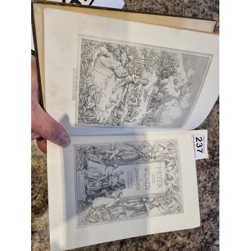 237 - Peter and Wendy hardback first edition by J M Barrie, dated 1911, in used condition with bumping to ... 