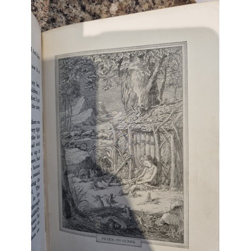 237 - Peter and Wendy hardback first edition by J M Barrie, dated 1911, in used condition with bumping to ... 