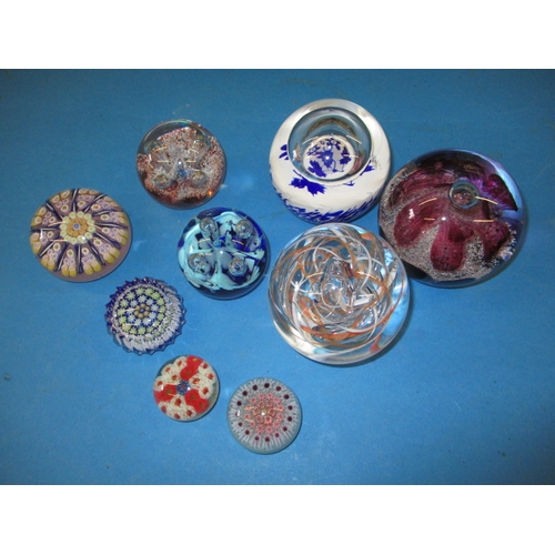 4 - A parcel of vintage glass paperweights, to include Caithness examples, all in good used condition, o... 