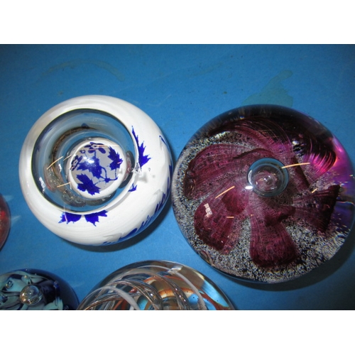 4 - A parcel of vintage glass paperweights, to include Caithness examples, all in good used condition, o... 