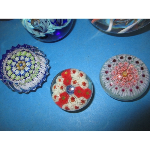 4 - A parcel of vintage glass paperweights, to include Caithness examples, all in good used condition, o... 