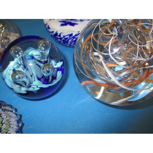 4 - A parcel of vintage glass paperweights, to include Caithness examples, all in good used condition, o... 