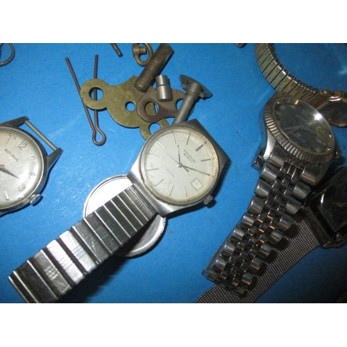 8 - A parcel of vintage watches, to include a silver cased pocket watch and silver Albert chain, all in ... 