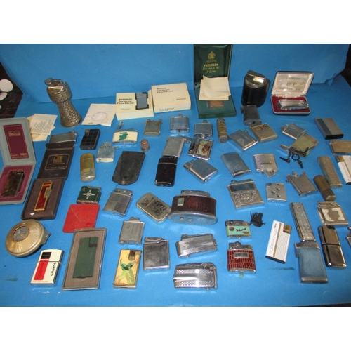 13 - A large quantity of vintage cigarette lighters, all in used condition and not tested as to function