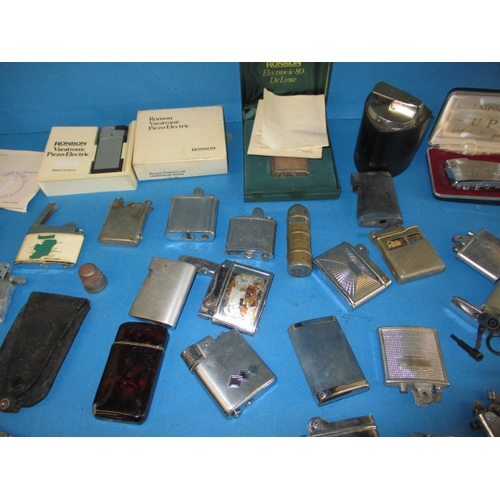 13 - A large quantity of vintage cigarette lighters, all in used condition and not tested as to function