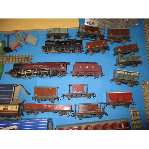 15 - A large quantity of vintage Hornby Dublo ‘00’ gauge 3 rail model railway items, to include locos rol... 