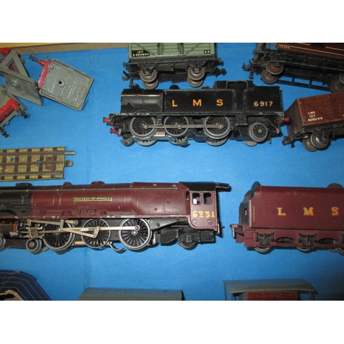 15 - A large quantity of vintage Hornby Dublo ‘00’ gauge 3 rail model railway items, to include locos rol... 