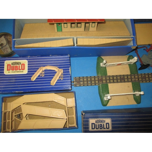 15 - A large quantity of vintage Hornby Dublo ‘00’ gauge 3 rail model railway items, to include locos rol... 