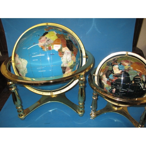 22 - Two terrestrial gemstone globes on revolving stands, approx. globe sizes are 30 and 20cm, both in go... 