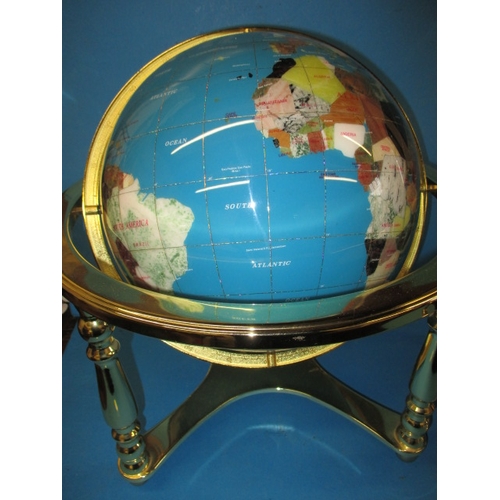 22 - Two terrestrial gemstone globes on revolving stands, approx. globe sizes are 30 and 20cm, both in go... 