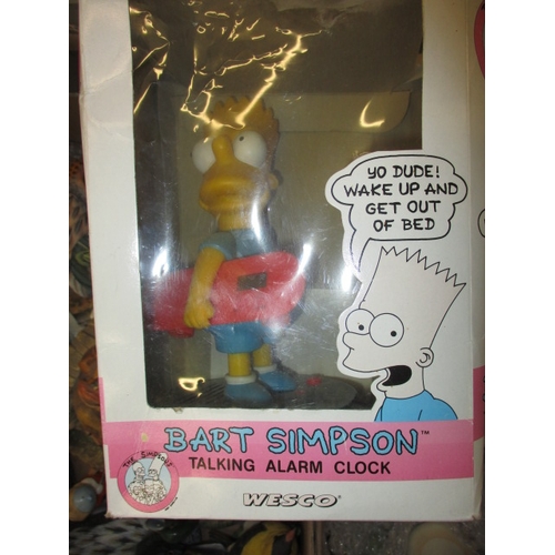 23 - A very large quantity of general clearance items, to include figures and a Bart Simpson alarm clock,... 