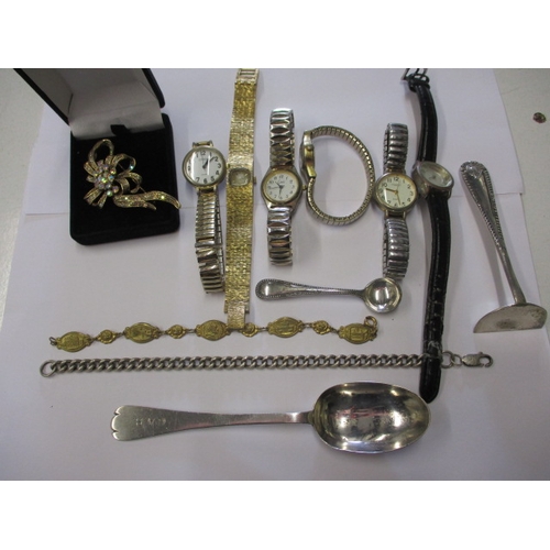 31 - A parcel of miscellanea to include watches and a sterling silver spoon and Albert chain 53.2g, all i... 