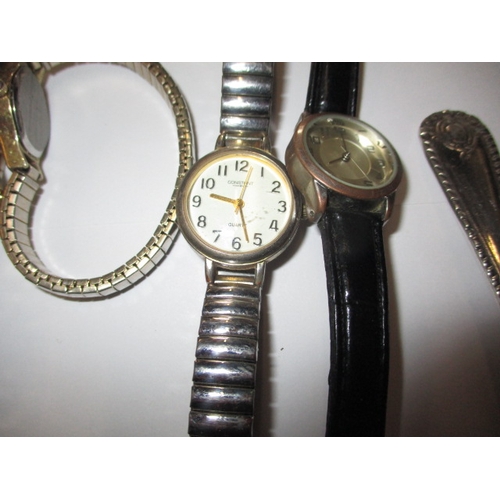 31 - A parcel of miscellanea to include watches and a sterling silver spoon and Albert chain 53.2g, all i... 