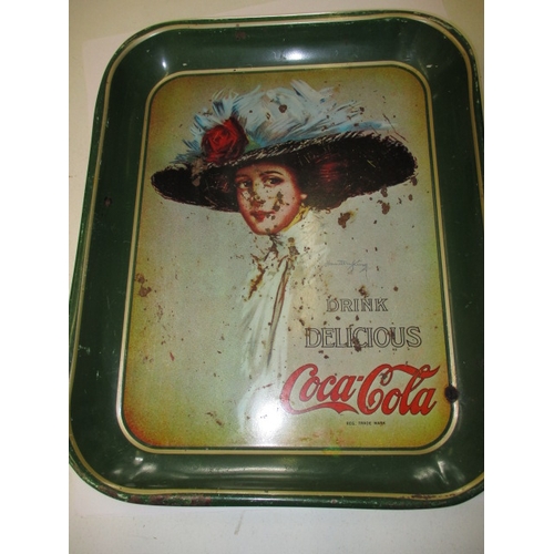 32 - A genuine 1930s Coco Cola  drinks tray, approx. size 33.5 x27.5cm, having some age-related marks