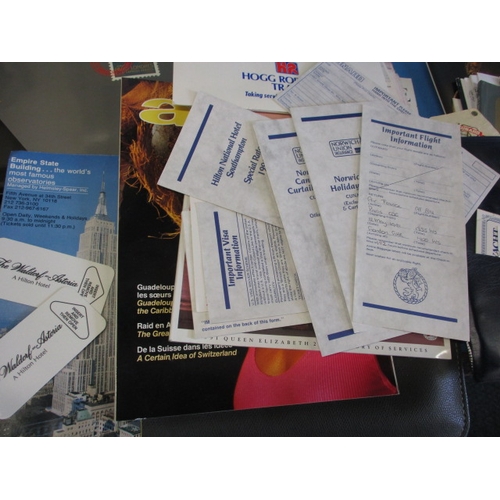 43 - A parcel of 1990s Concorde and QEII memorabilia, to include document pouches and booklets, all in go... 