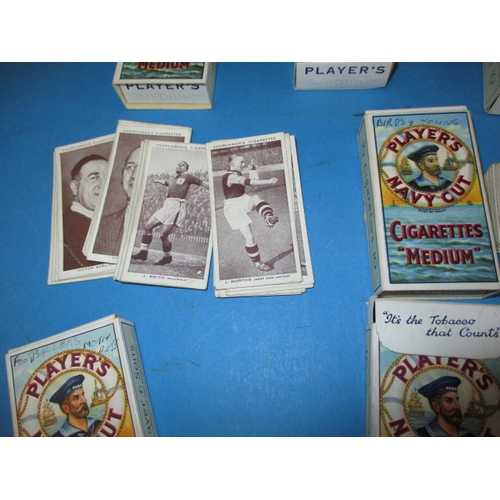 44 - A quantity of vintage cigarette cards, to include some sets in albums, all in used condition