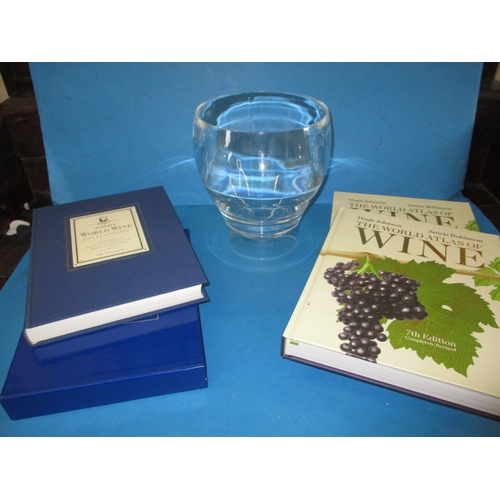 45 - Two books on wines and an ice bucket, all in good used condition