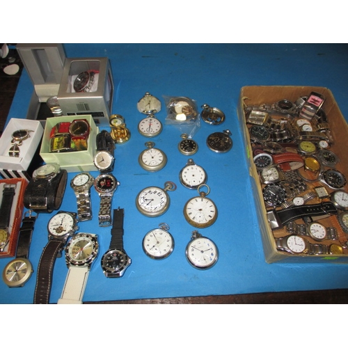 57 - A large quantity of vintage pocket and wrist watches, all in used condition, those pictured to left ... 