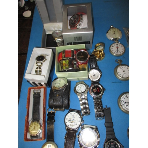 57 - A large quantity of vintage pocket and wrist watches, all in used condition, those pictured to left ... 