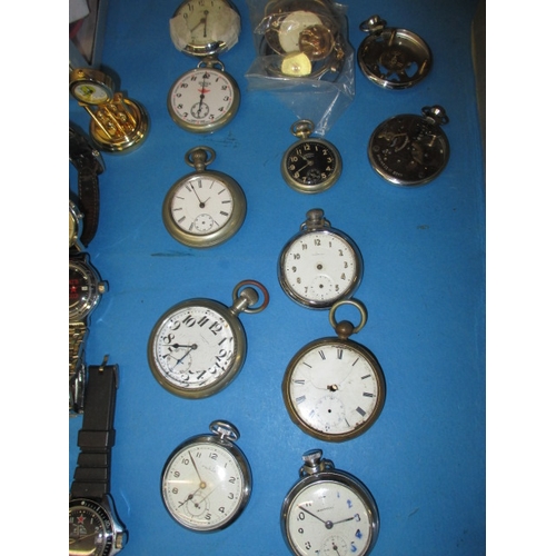 57 - A large quantity of vintage pocket and wrist watches, all in used condition, those pictured to left ... 