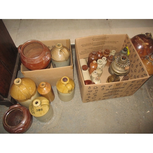 61 - A quantity of stoneware pots and bottles, some damages and some named