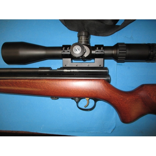 68 - A SMK QB78DL 5.5mm co2 powered air rifle with a Hawke Sidewinder 4-16x50 scope, in working order wit... 