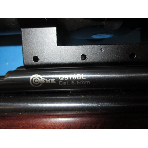 68 - A SMK QB78DL 5.5mm co2 powered air rifle with a Hawke Sidewinder 4-16x50 scope, in working order wit... 