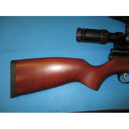 68 - A SMK QB78DL 5.5mm co2 powered air rifle with a Hawke Sidewinder 4-16x50 scope, in working order wit... 