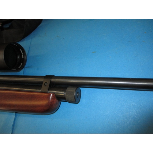 68 - A SMK QB78DL 5.5mm co2 powered air rifle with a Hawke Sidewinder 4-16x50 scope, in working order wit... 