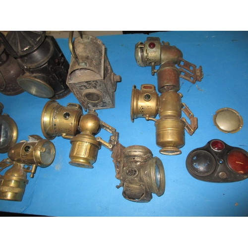 69 - A parcel of vintage cycle and other lamps, various ages, all in used condition with some damages