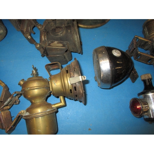 69 - A parcel of vintage cycle and other lamps, various ages, all in used condition with some damages