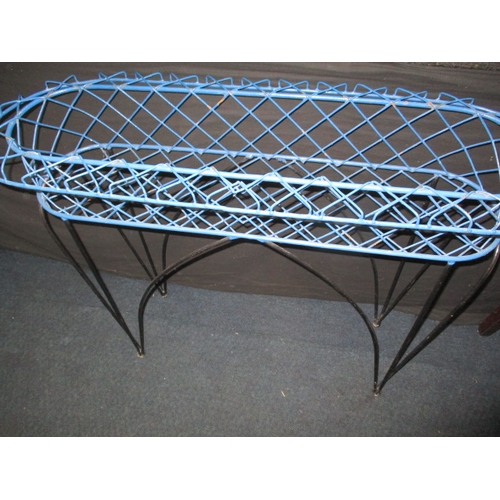 73 - A vintage wire plant stand, approx. length 100cm in usable pre-owned condition