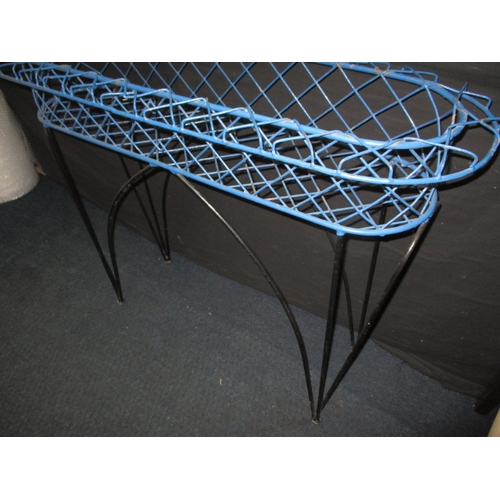 73 - A vintage wire plant stand, approx. length 100cm in usable pre-owned condition