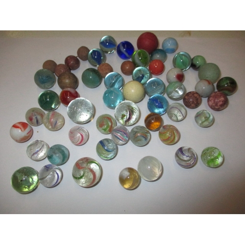 79 - A quantity of antique and later glass marbles, to include some German examples, all in used conditio... 