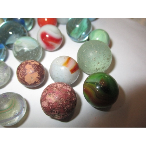 79 - A quantity of antique and later glass marbles, to include some German examples, all in used conditio... 