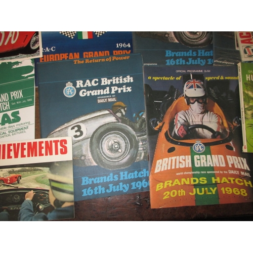 88 - A parcel of vintage motor racing ephemera, to include 1960s formula one grand prix programmes, all i... 