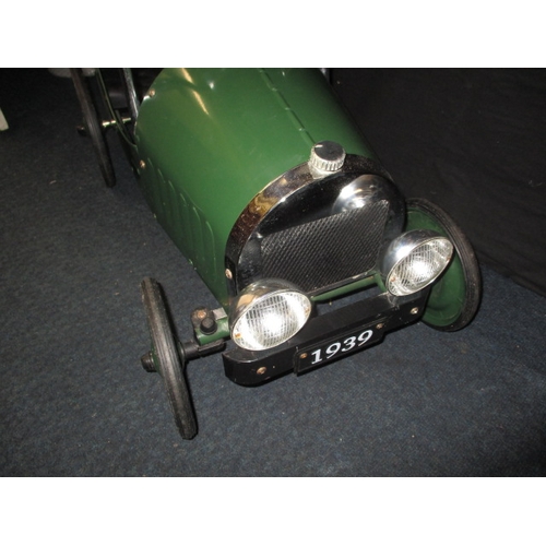 98 - A vintage style child’s pedal car, in good pre-owned condition